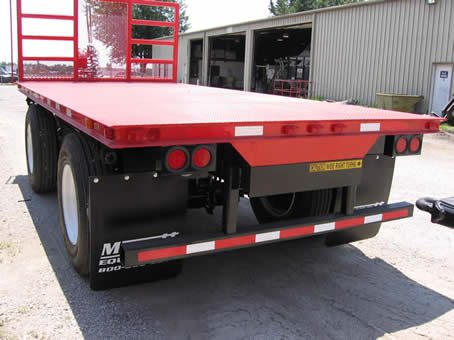 16' Mynatt spread axle Pup Trailer painted safety orange. Ready for delivery to customer.